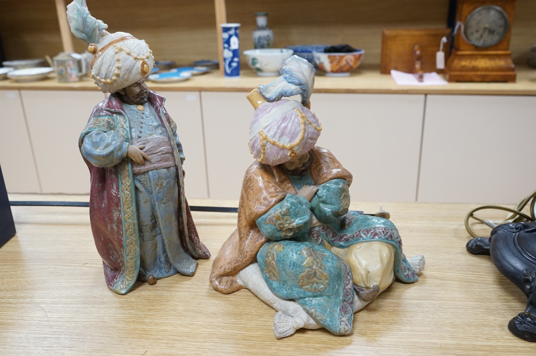 Two Lladro polychrome stoneware figures of ‘Sultans’.(2) tallest 40cm.